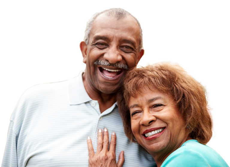 A happy older man and woman cuddling