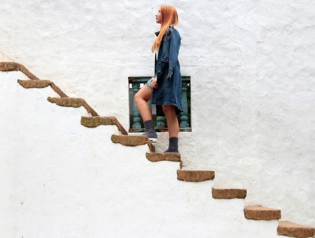 woman climbing the stairs

